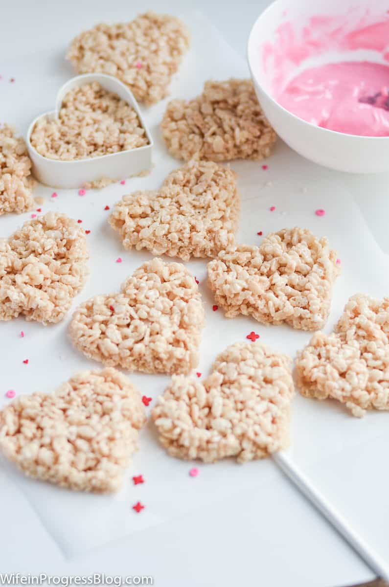 Cutting out heart shapes from the Rice Krispies Treats