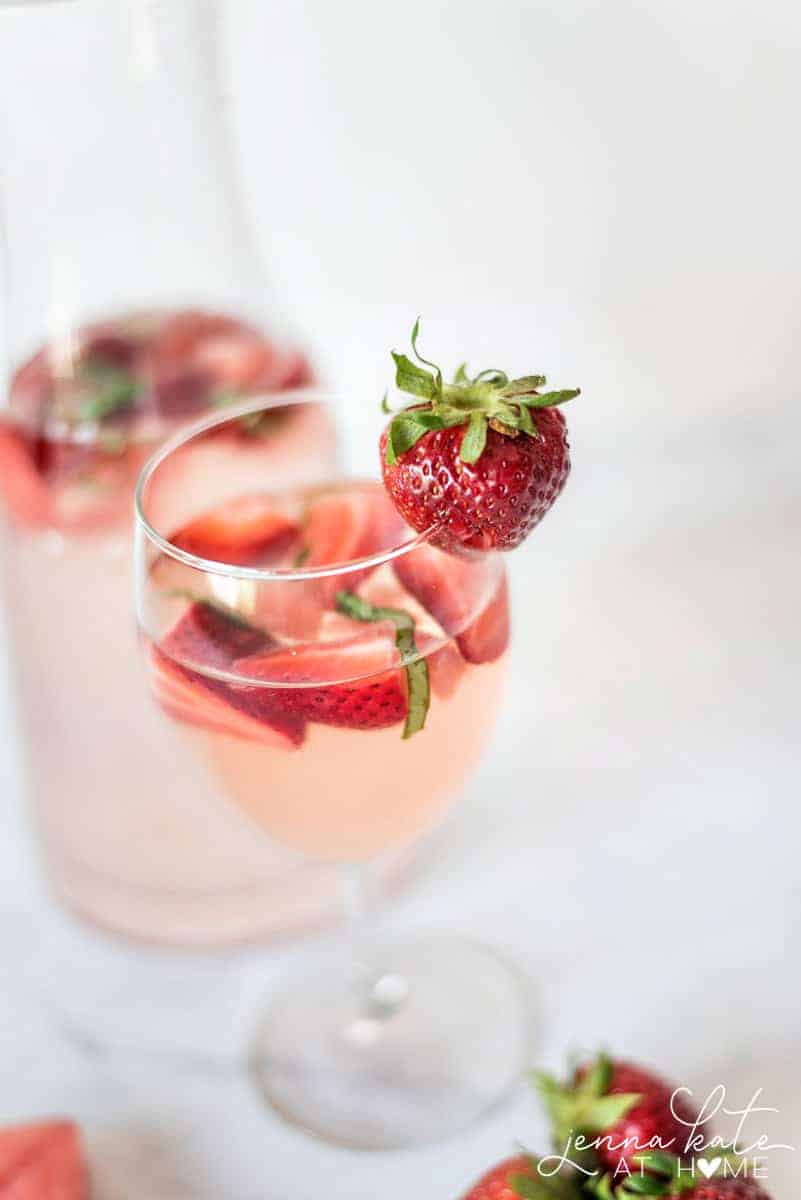 This easy rosé cocktail is made with simple ingredients, rosé wine, strawberries, watermelon, basil and a splash of vodka