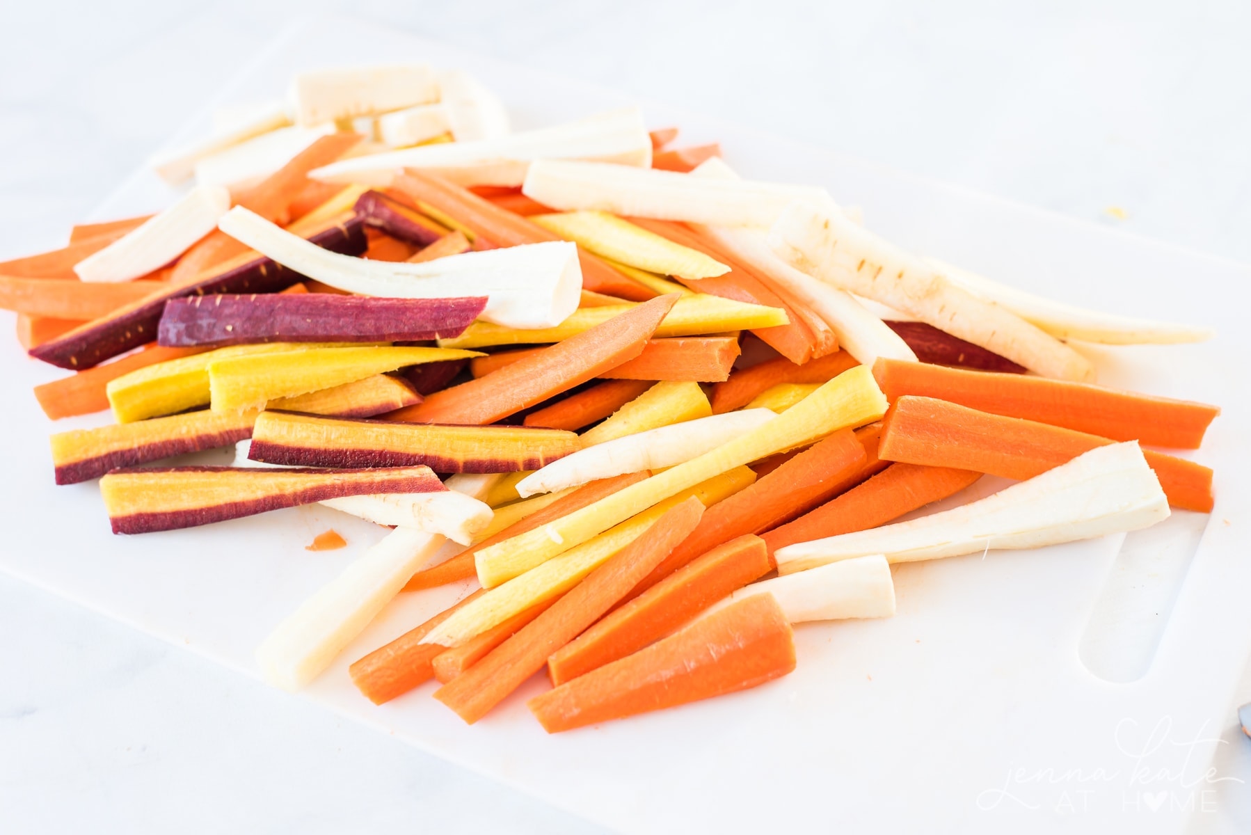These colorful root vegetables are fresh and ready to be roasted to perfection for this one-pan Thanksgiving dinner
