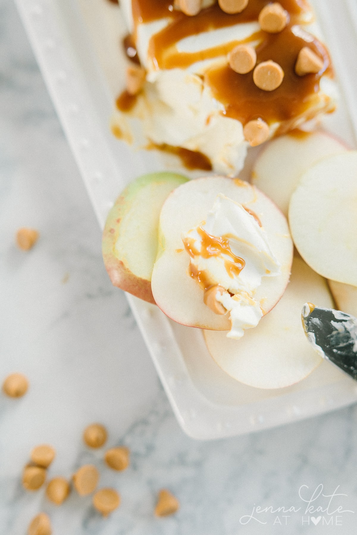 Apples with cream cheese dip smeared on top
