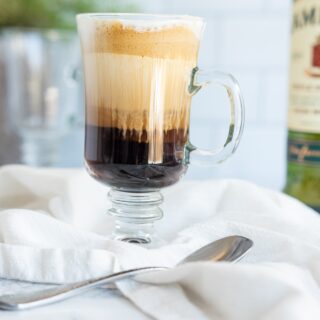 traditional Irish coffee in a glass coffee cup
