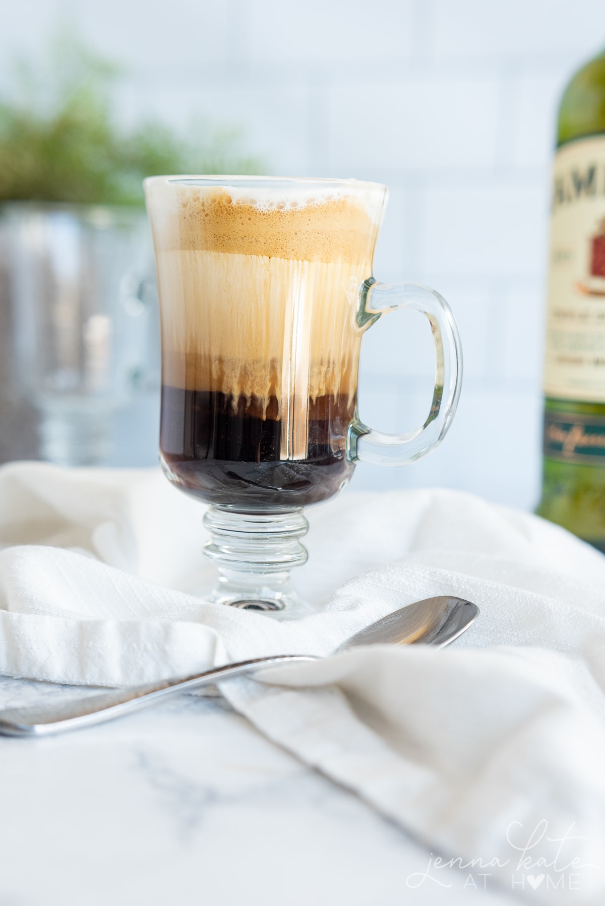 traditional Irish coffee in a glass coffee cup