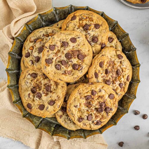 plate of chocolate chip cookies with toffee bits