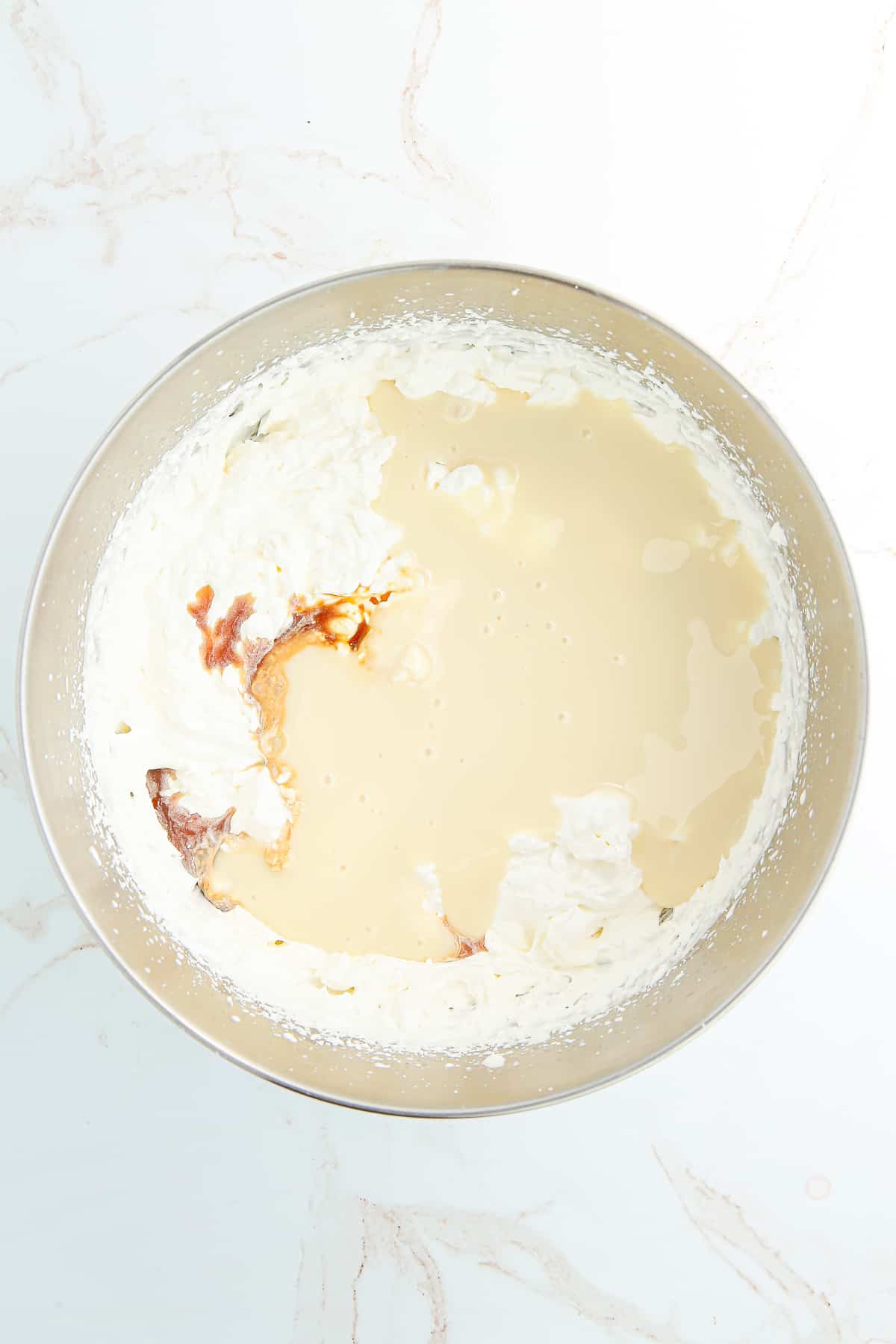 whipped cream with sweetened condensed milk and vanilla