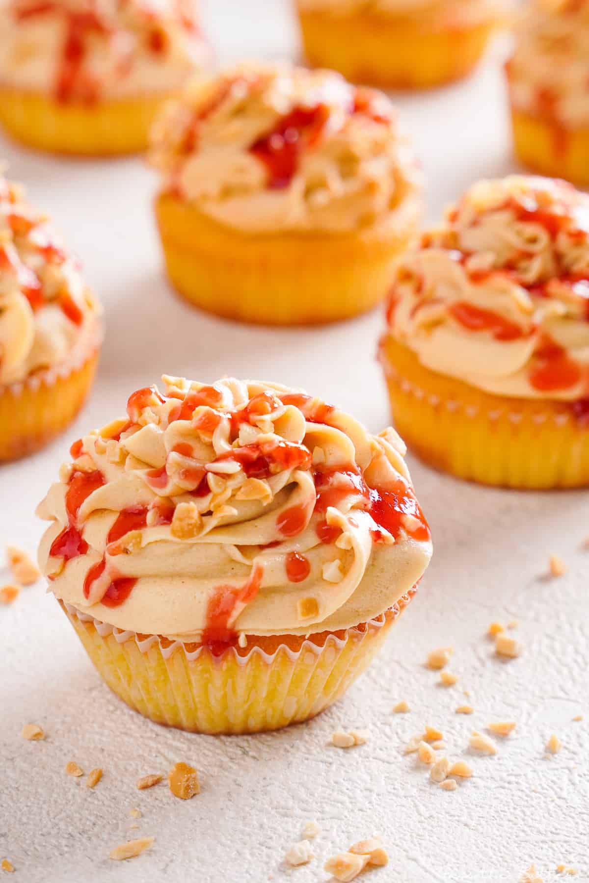 Close up view of peanut butter and jelly cupcakes.